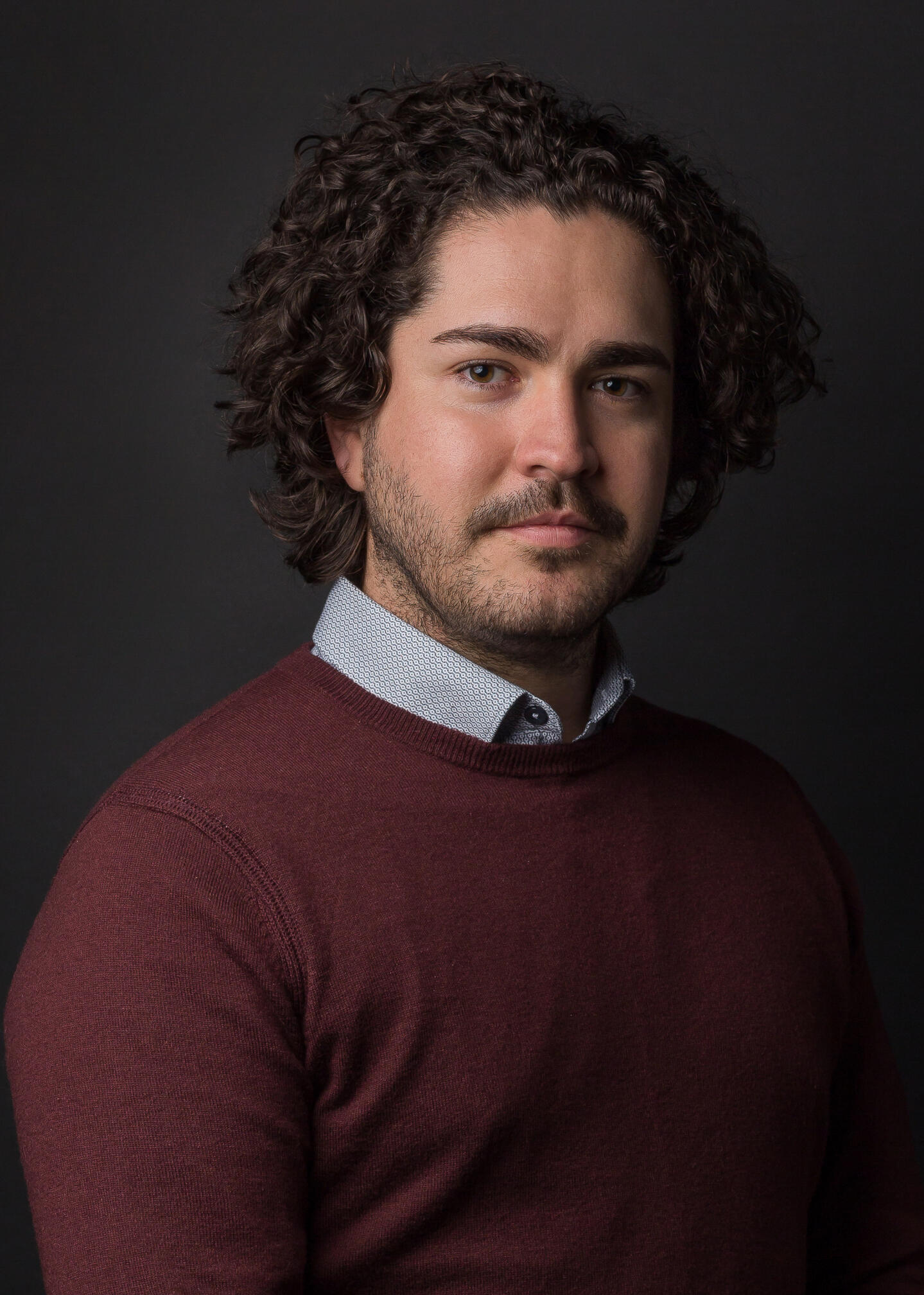 Profile photo of Michael in casual business attire.